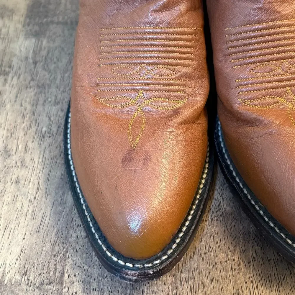 Tony Lama signs ostrich cowboy